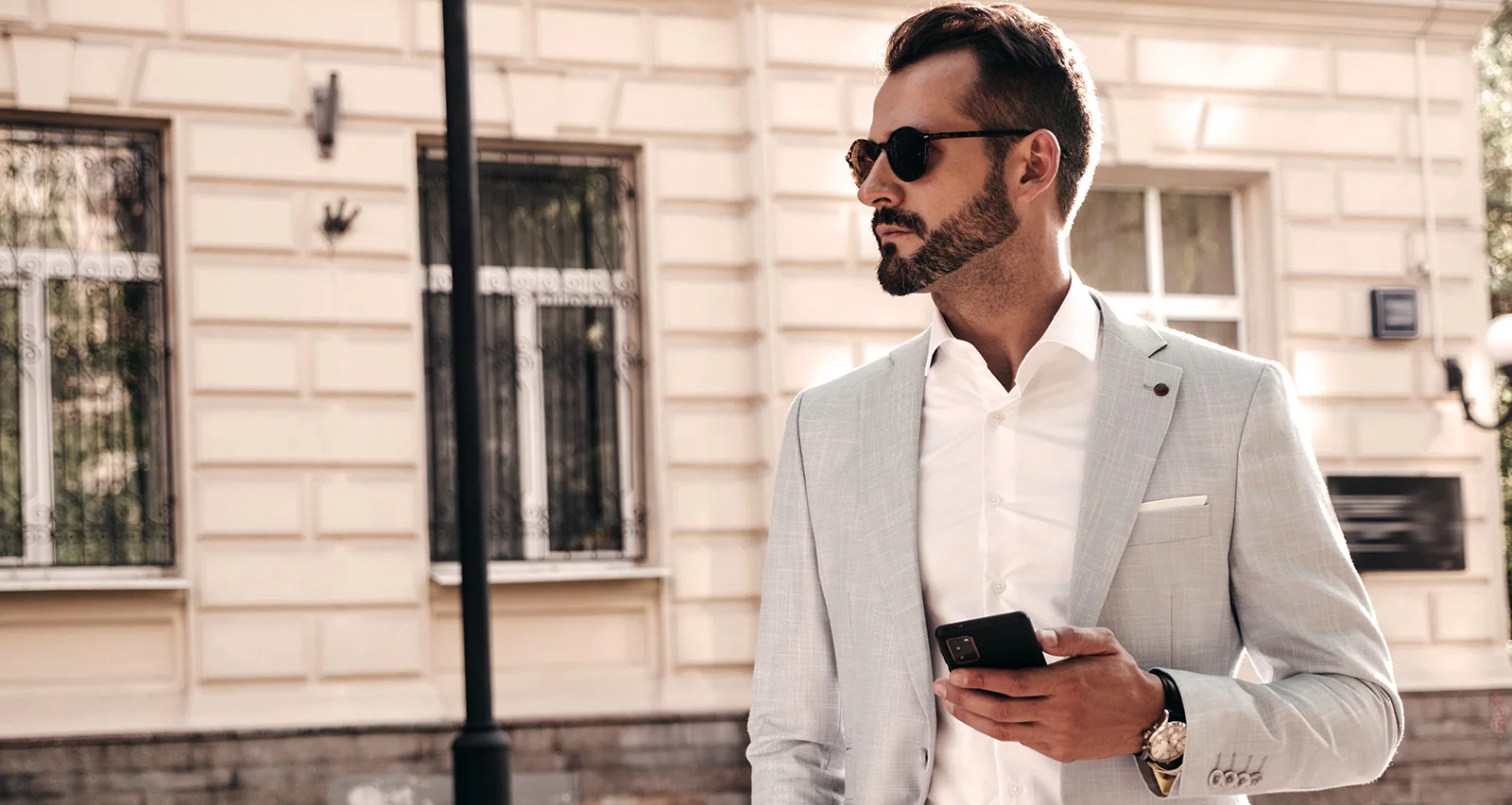 Portrait of handsome confident man in suit